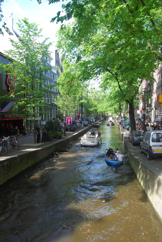23 - The Groenburgwal canal in Amsterdam, which is lined with historic 17th-century buildings and trees